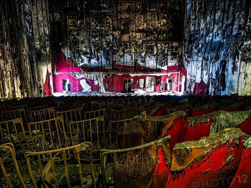 Abandoned and burned cinema hall in an old multiplex cinema
