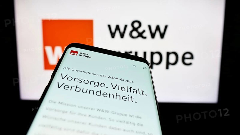 Stuttgart, Germany, 24/08/2023: Mobile phone with the website of the German company Wüstenrot Württembergische AG (WW) on the screen in front of the logo. Focus on the top left of the mobile phone display, Europe