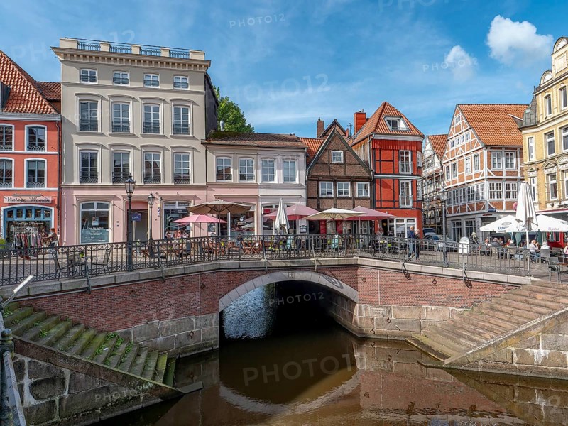Brick-walled barrel-vaulted bridge Hudebrücke and stairs to the river Schwinge as well as historic half-timbered houses and gabled houses in the old town of Stade, Hanseatic city of Stade, Lower Saxony, Germany, Europe