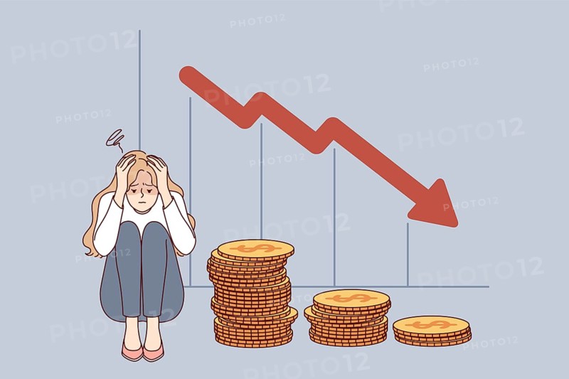 Problem of bankruptcy for girl lost savings due to financial crisis, sitting near falling economic chart. Girl is bankruptcy fighter after being fired from job and losing investments