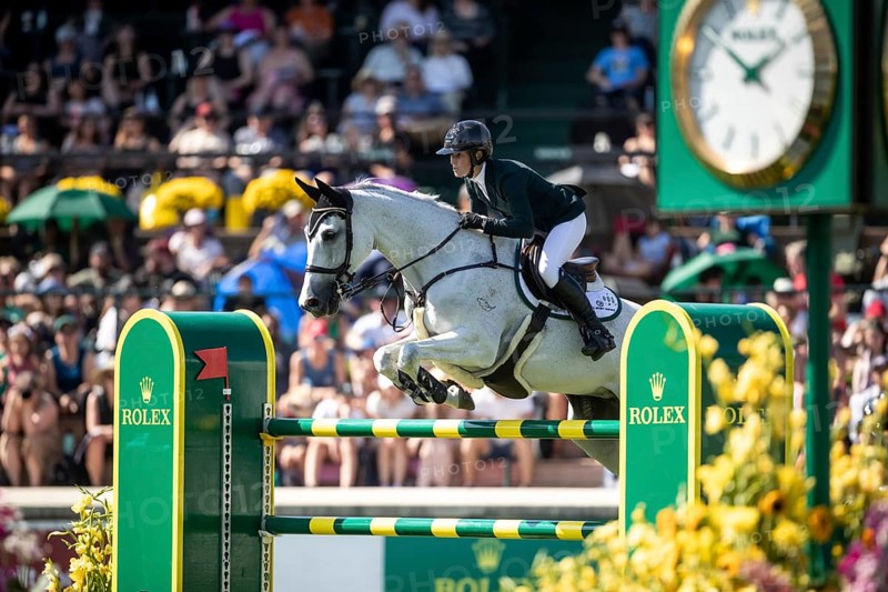 Hilary Scott of Australia and riding Oaks Milky Way compete in the first round of the 1.60m CPKC International during the Spruce Meadows Masters, presented by Rolex, in Calgary, Alberta, Canada, North America