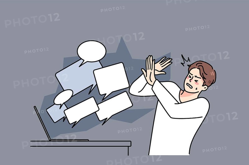Stressed man overwhelmed with online negative comments and messages on computer. Unhappy guy struggle with hate and bullying on internet. Abuse on social media. illustration