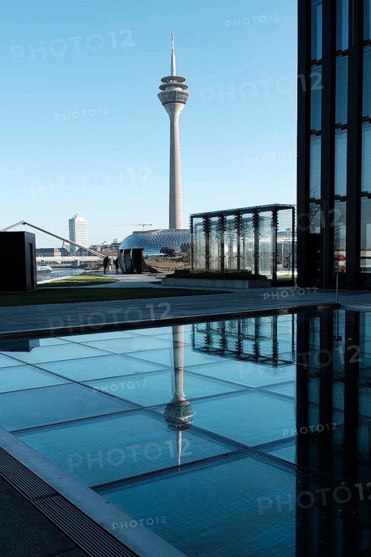 View of the Rhine Tower in the Media Harbour, reflection, Düsseldorf, Germany, Europe