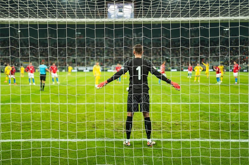 Net in the football goal penalty shootout in the background.