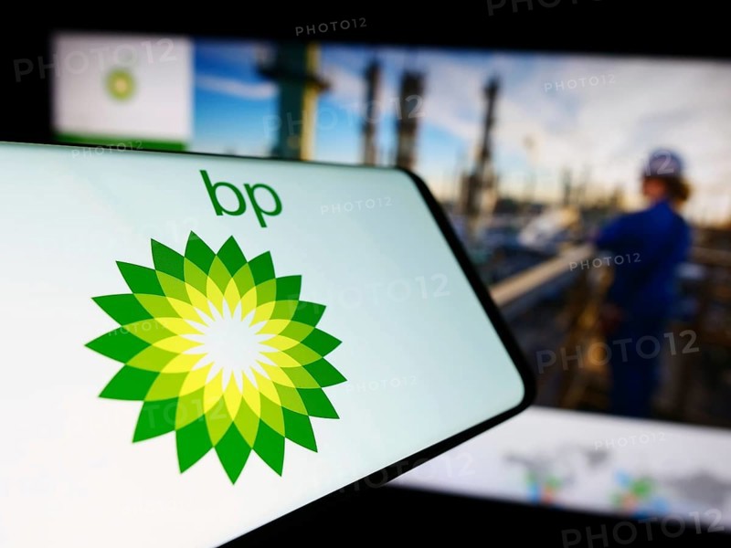 Stuttgart, Germany, 11-16-2023: Cellphone with logo of British oil and gas company BP plc in front of business website. Focus on center-left of phone display, Europe