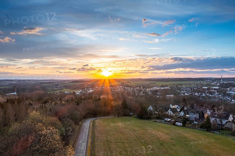Sunset, Aerial view over forests and meadows of Westerwald, Altenkirchen, Germany, Europe