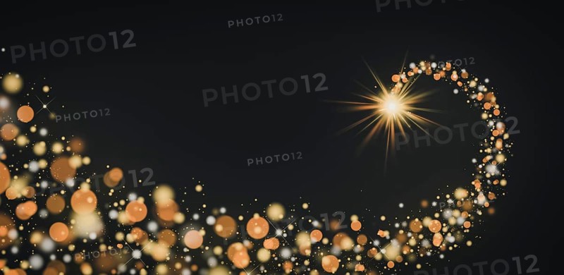 Shining star Christmas background shooting star make wish golden glittering lights bokeh particles black background copy space