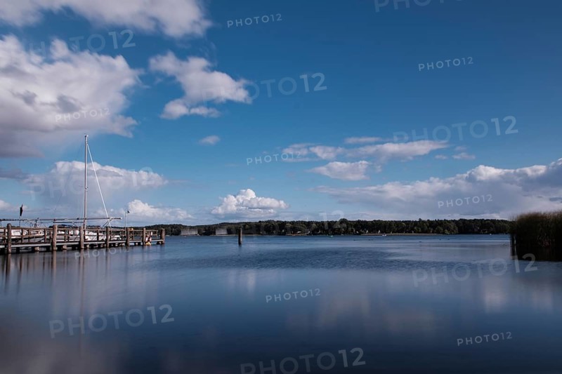 View over the Scharmützelsee with jetty and marina, long exposure, Wendisch-Rietz, Brandenburg, Germany, Europe