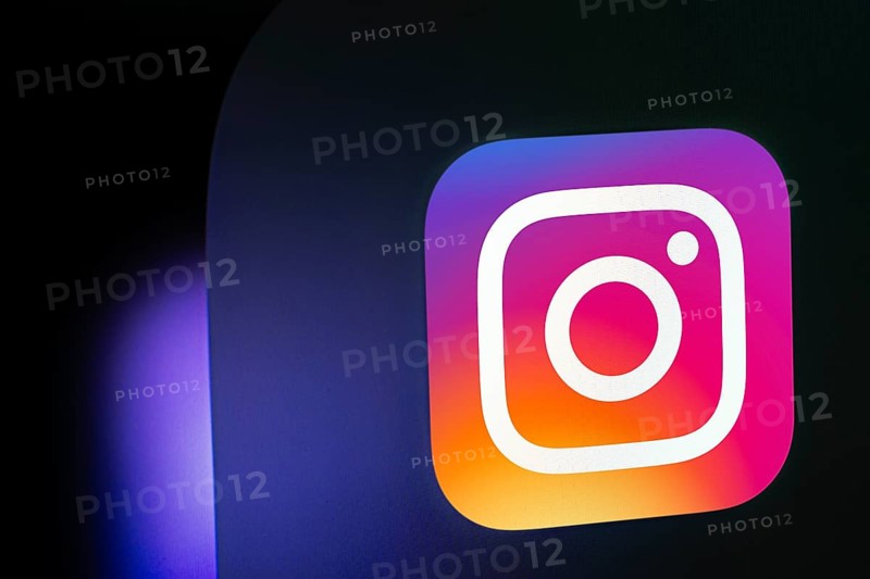 A close up of an iPad screen displaying the instagram app icon