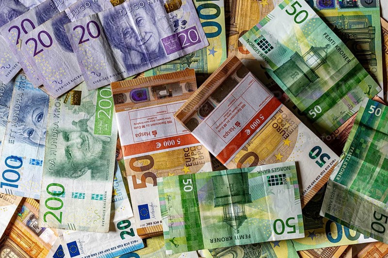 Banknotes, euro, Norwegian krone and Swedish krona, piles and bundles