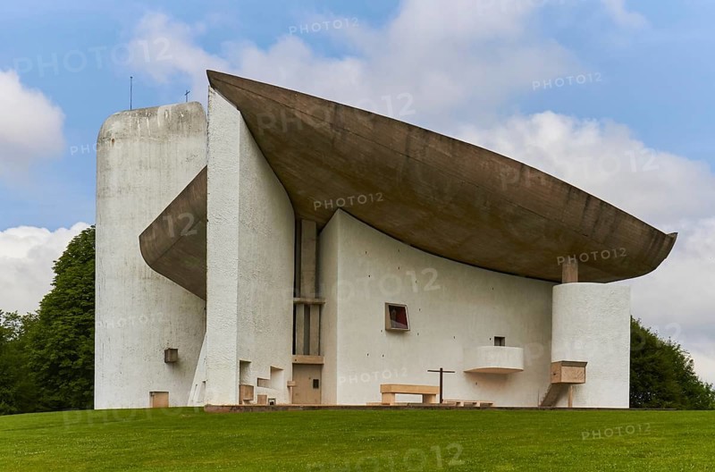 Modern church by Le Corbusier with striking concrete roof construction. Notre Dame du Haut chapel in Ronchamp, a UNESCO World Heritage Site in the Haute-Saône department of Franche-Comté. France