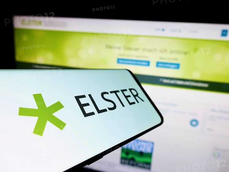 Stuttgart, Germany, 10-15-2022: Cellphone with logo of German tax software Elster on screen in front of website. Focus on center-left of phone display, Europe
