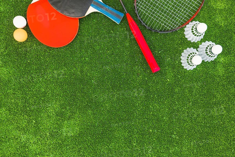 Ping pong balls shuttlecocks badminton rackets green turf