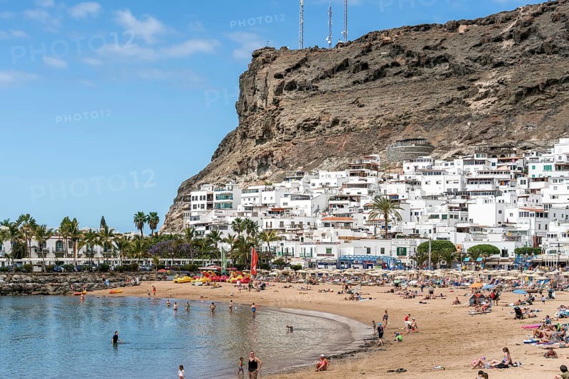 PUERTO DE MOGAN, GRAN CANARIA, CANARY ISLANDS - MARCH 7 : View of the beach in Puerto de Mogan Gran Canaria on March 7, 2022. Unidentified people