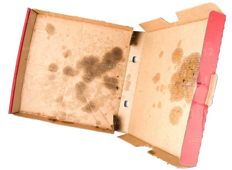 above view of greasy empty delivery pizza box