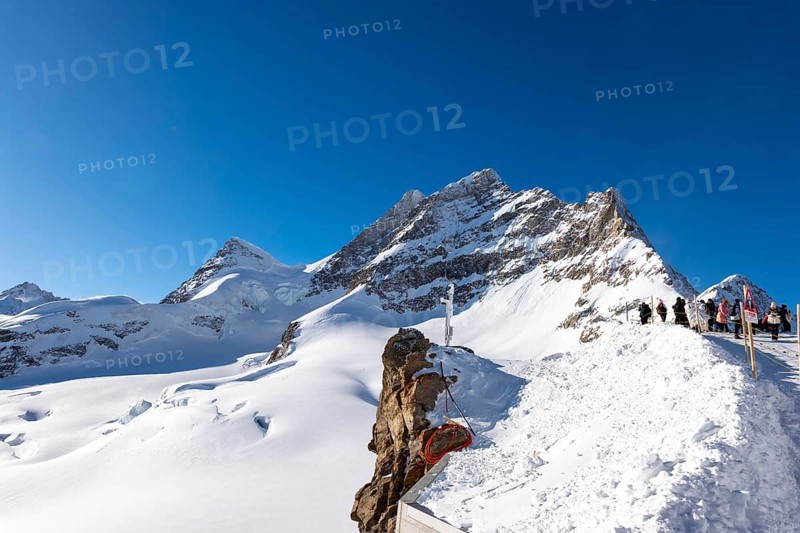 Mountain Peak Jungfrau 4158 Meters High and Aletsch Glacier in a Sunny Winter Day with Snowcapped with Sunlight in Berner Oberland, Grindelwald, Canton Bern, Canton Valais, Switzerland, Europe