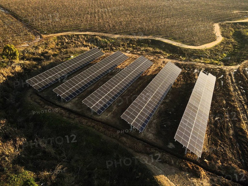 Aerial view of solar power plant solar panels on vineyard. Electric panels for producing clean ecologic energy