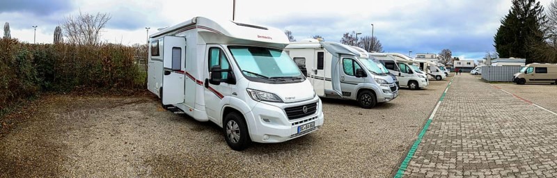 Panoramic photo with many motorhomes at the Kehl am Wasserturm car park, Kehl, Baden-Württemberg, Germany, Europe