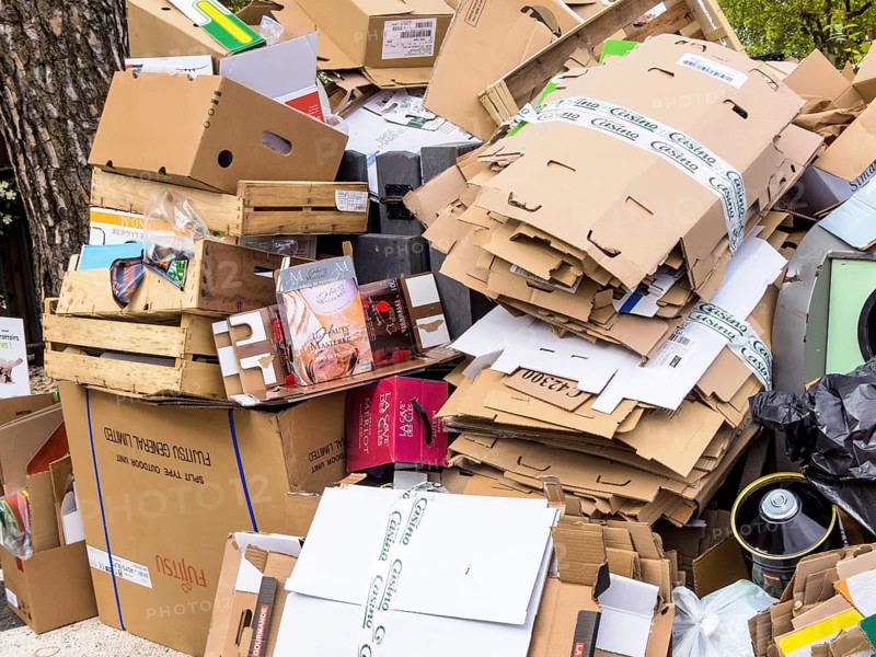 Mountains of cardboard on the street Waste paper from packaging is collected