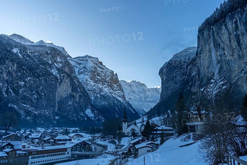 Lauterbrunnen Valley and Snowy Mountains in Winter Morning. Swiss Alps. Switzerland