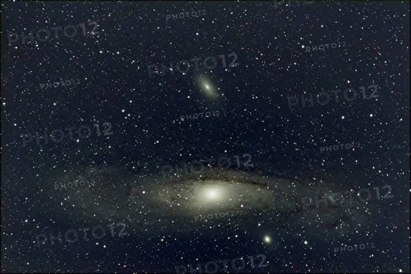 An impressive close-up of a large spiral galaxy (M 31, Andromeda Nebula) surrounded by countless stars in the deep night sky, Haibach, Lower Bavaria