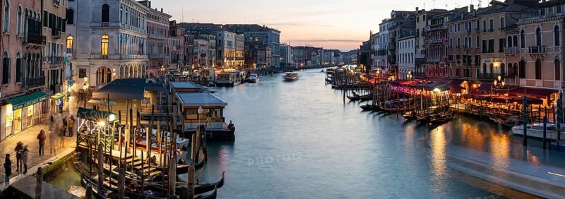 Evening light at sunset, view over the Grand Canal, gondola and boats, from the Rialto Bridge, panoramic shot, Venice, Veneto, Italy, Europe