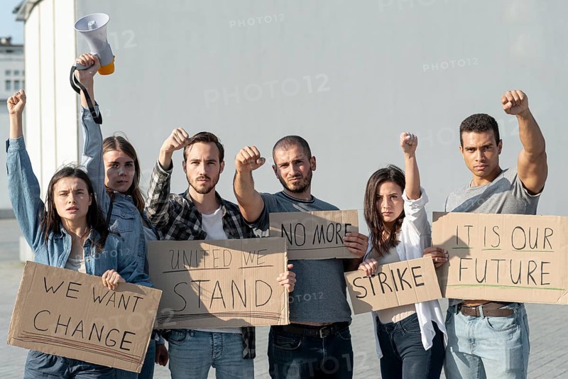 Group protesters marching together