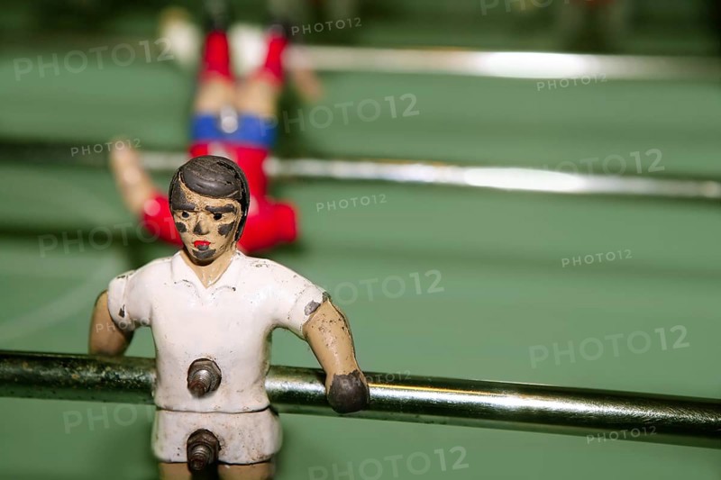 Aged table foosball player macro detail