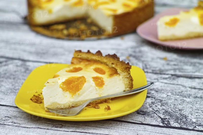 Freshly baked Schmandt cake with tangerines