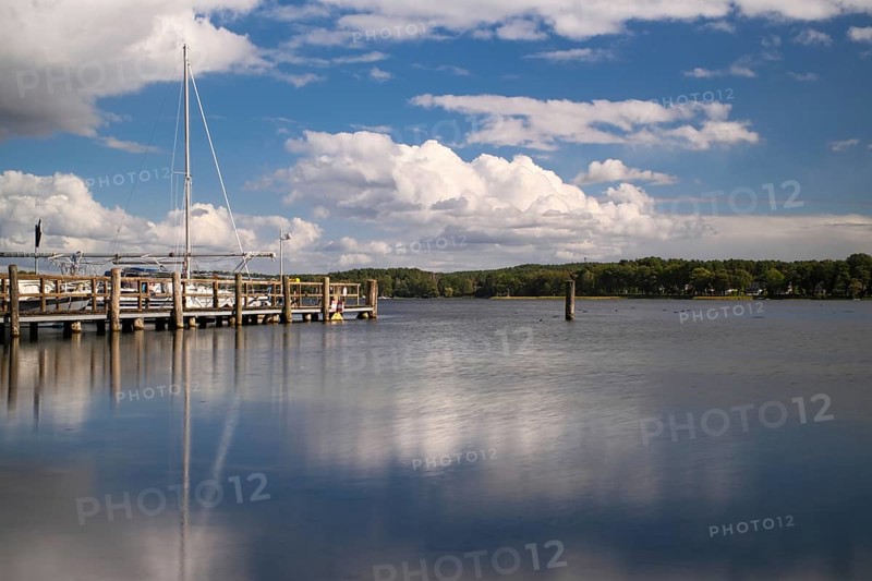View over the Scharmützelsee with jetty and marina, long exposure, Wendisch-Rietz, Brandenburg, Germany, Europe