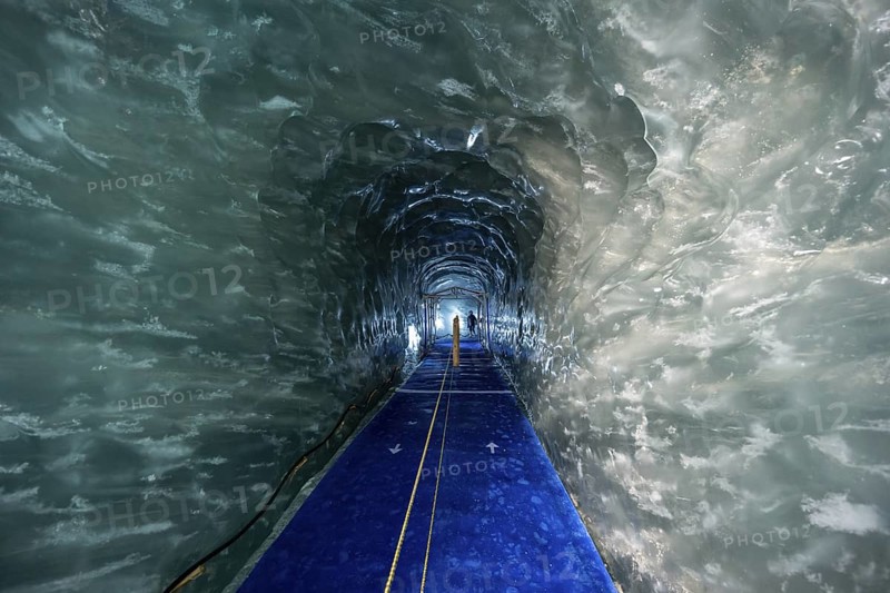 Artificial ice cave through the glacier ice, Mer de Glace, Montenvers, Chamonix, Haute-Savoie, France, Europe