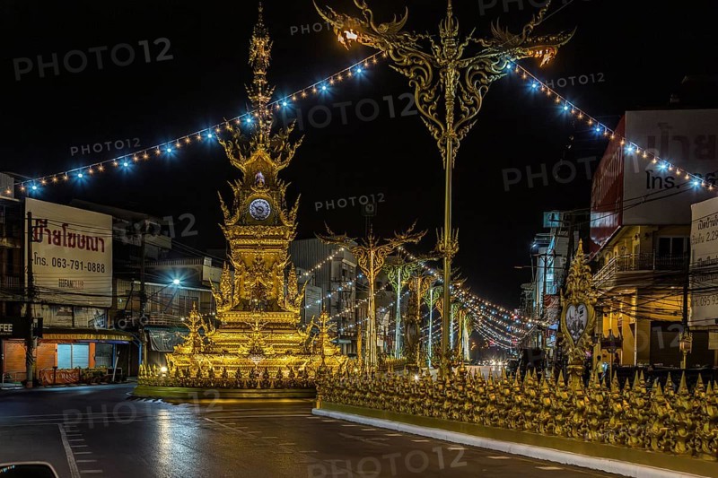 Clock Tower of Chiang Rai monument designed by local artist Chalermchai Kositpipat to honor the late Thai king