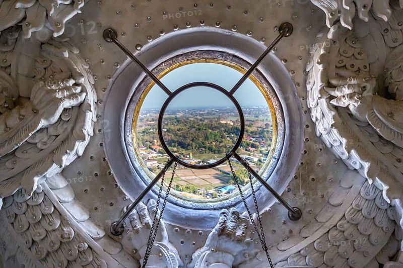 View from the inside of the head of the Guan Yin (Goddess of Mercy) statue at Wat Huay Pla Kang Temple in Chiang Rai province of Northern Thailand