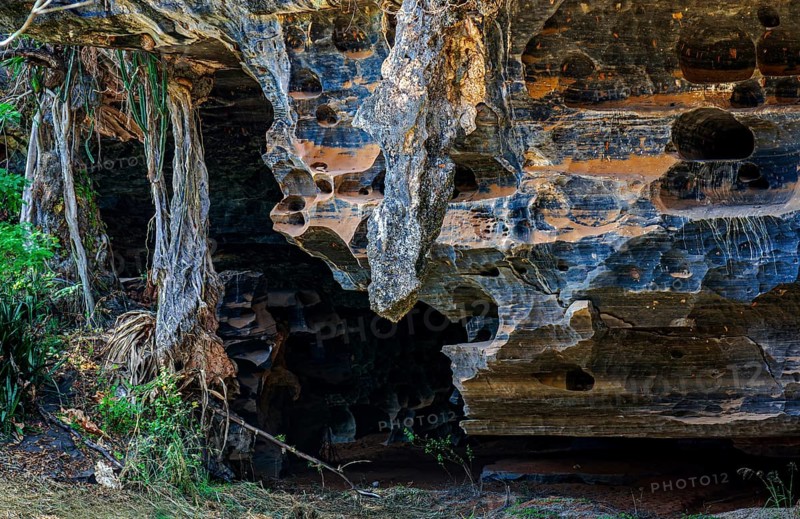Entrance to a cave and rock formation typical of Lapinha da Serra in the state of Minas Gerais, Lapinha da Serra, Minas Gerais, Brazil, South America