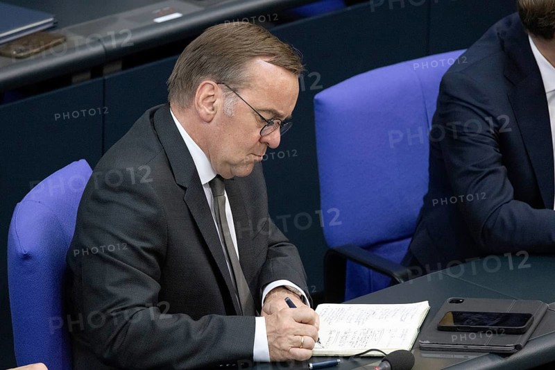 Berlin, Germany - 24.6.2025: Defence Minister Boris Pistorius takes notes during the government statement by Federal Chancellor Friedrich Merz on the NATO summit and the European Council in the Bundestag in Berlin