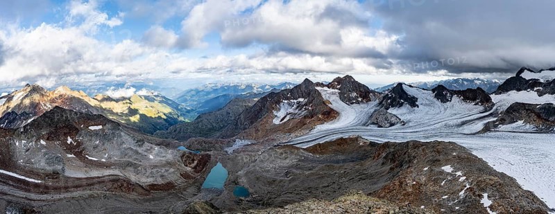 Panorama from the summit of the Becher, high mountain landscape, view of mountain peaks Königshofspitz and Schwarzwandspitz with glacier of the Übeltalferner, view of the Ridnaun valley, Stubai Alps, South Tyrol, Italy, Europe