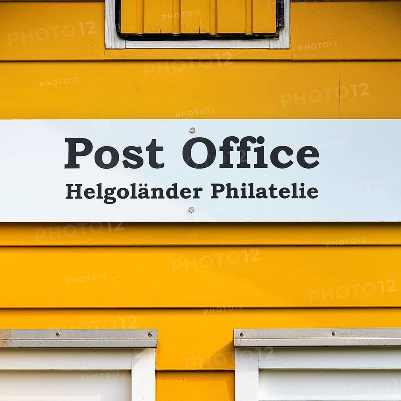 Yellow lobster shack, sign with inscription post office, Helgoland philately, facade detail, Museum Helgoland, Helgoland, Schleswig-Holstein, Germany, Europe