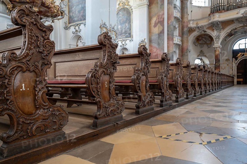 Decoratively carved cheeks of the lay pews in the baroque Basilica of St Alexander and St Theodore, Ottobeuren Monastery, Ottobeuren, Unterallgäu, Bavaria, Germany, Europe