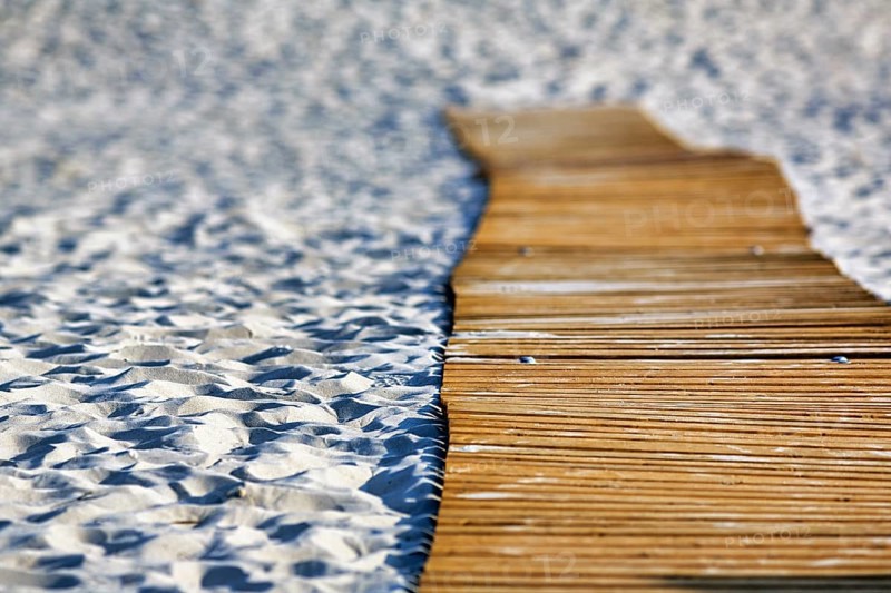 Empty wooden path on the sandy beach, wooden mat in the sand, barrier-free access, wheelchair-accessible, mobility, limitation, symbolic image, Insel Düne, Heligoland, Schleswig-Holstein, Germany, Europe