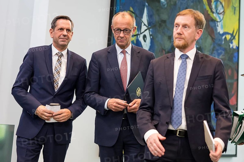 Olaf Lies (SPD, Minister President of Lower Saxony), Friedrich Merz (CDU, Federal Chancellor) and Michael Kretschmer (CDU, Minister President of the Free State of Saxony) after a press conference on the consultation between Federal Chancellor Friedrich Merz and the heads of government of the federal states at the Federal Chancellery, Berlin, 18 June 2025