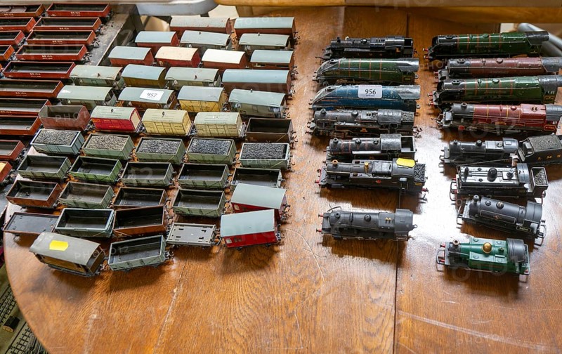 Model railway toy train set items on display for sale at auction room, UK