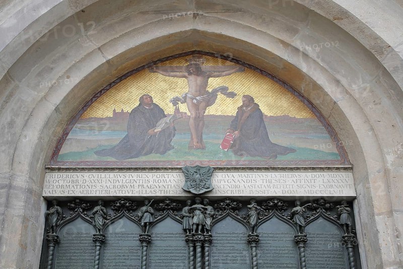 Thesis door with tympanum and crucifix with Philipp Melanchthon and Martin Luther, wall mosaic, arts and crafts, UNESCO, castle church, castle, Luther city Wittenberg, Fläming, Saxony-Anhalt, Germany, Europe