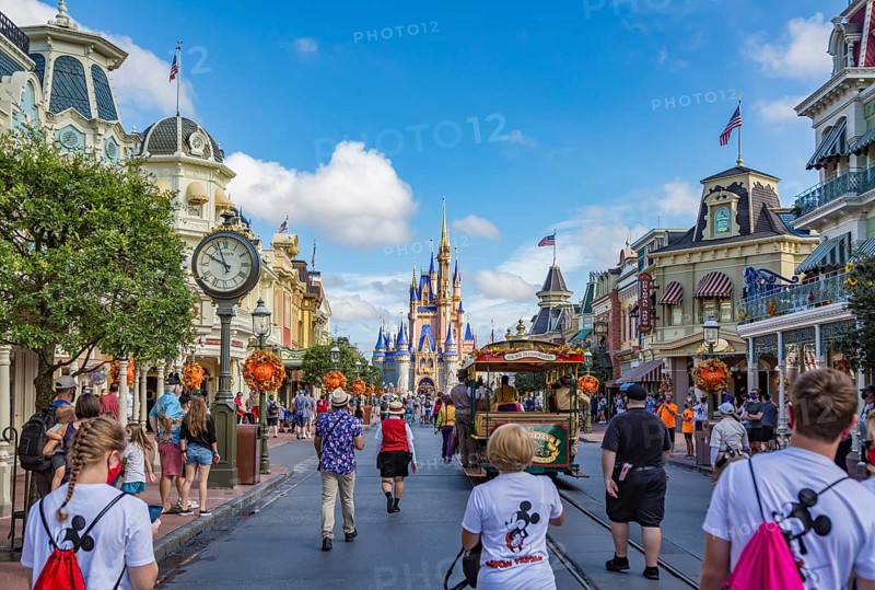 Horse pulling trolley car with Disney characters down Main Street in the Magic Kingdom at Walt Disney World, Orlando, Florida