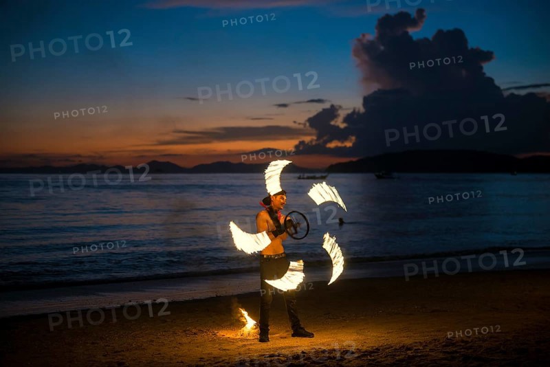 Fire show, jugglers with fire, Ao Nang Beach, sunset, Ao Nang, Krabi, Thailand, Asia