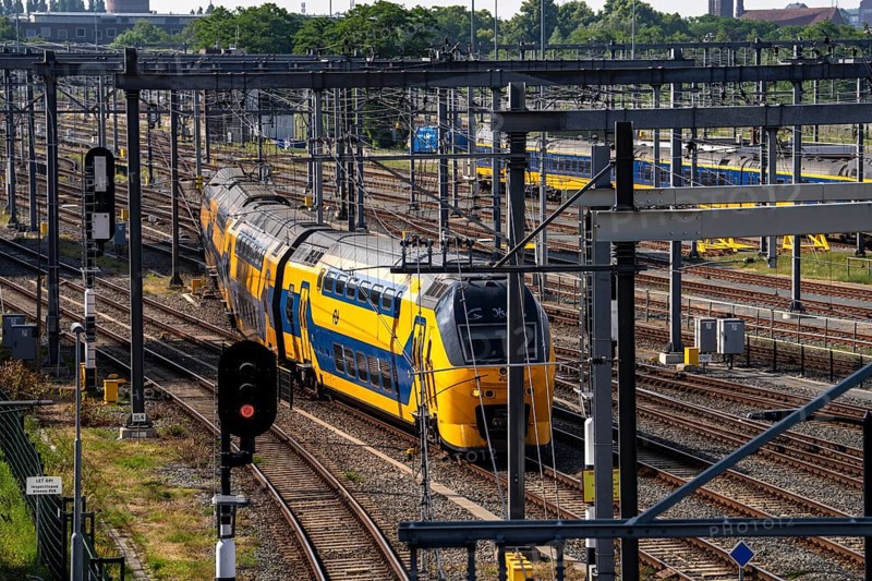 Rail transport in the Netherlands, Nederlandse Spoorwegen, Intercity train, double-decker IC VIRM, on the tracks in front of Utrecht Centraal station, Netherlands