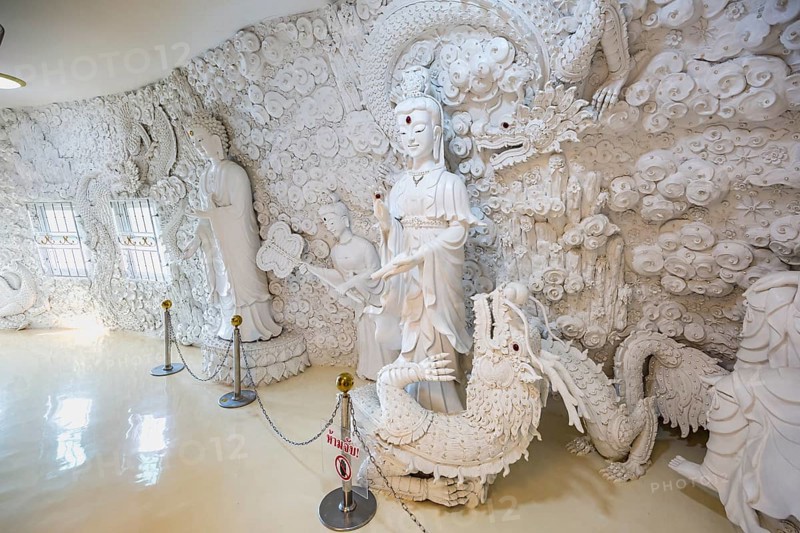 Ornate carvings on the walls at the Guan Yin (Goddess of Mercy) statue at Wat Huay Pla Kang Temple in Chiang Rai province of Northern Thailand
