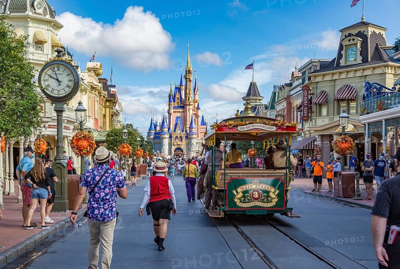 Horse pulling trolley car with Disney characters down Main Street in the Magic Kingdom at Walt Disney World, Orlando, Florida