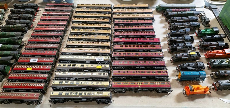 Model railway toy train set items on display for sale at auction room, UK