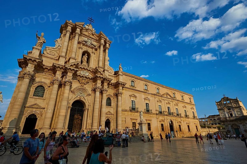 Cathedral of Syracuse, shot of the baroque cathedral from a distance with a busy square under a clear sky, Ortigia Island, Isola di Ortigia, Historic Centre, Syracuse, Sicily, Italy, Europe