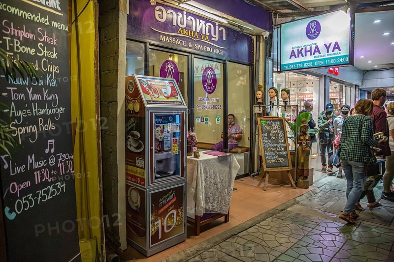 Akha Ya Massage and Spa with menu of services on downtown street in Chiang Rai, Thailand, Asia